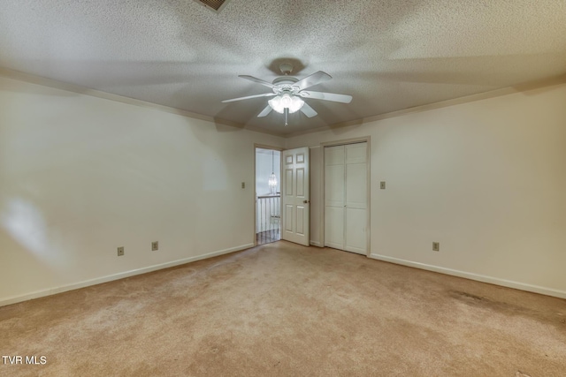 3510 Bondwood Cir, Johnson City, TN 37604 - spare room featuring light carpet, a ceiling fan, baseboards, a textured ceiling, and ornamental molding
