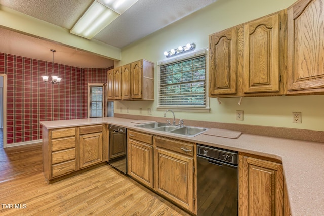3510 Bondwood Cir, Johnson City, TN 37604 - kitchen featuring dishwasher, a sink, a peninsula, and light wood-type flooring
