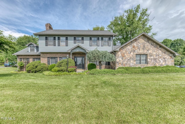 3510 Bondwood Cir, Johnson City, TN 37604 - view of front of property featuring a chimney, a front lawn, and brick siding