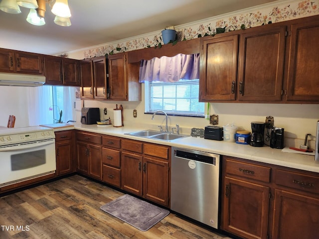 7083 Saint Clair Rd, Whitesburg, TN 37891 - kitchen featuring dishwasher, white electric stove, a sink, under cabinet range hood, and light countertops