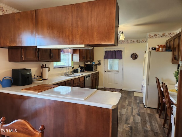 7083 Saint Clair Rd, Whitesburg, TN 37891 - kitchen featuring a sink, stainless steel appliances, light countertops, and dark wood-type flooring