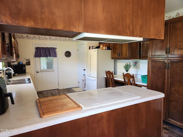 7083 Saint Clair Rd, Whitesburg, TN 37891 - kitchen featuring white appliances, a sink, light countertops, and dark wood-style floors