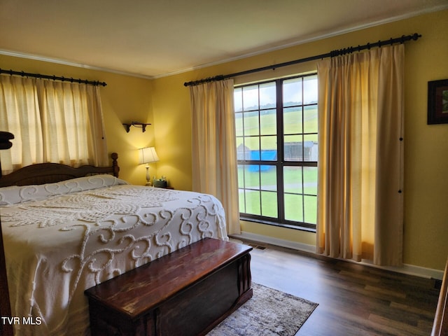 7083 Saint Clair Rd, Whitesburg, TN 37891 - bedroom with ornamental molding, wood finished floors, and baseboards
