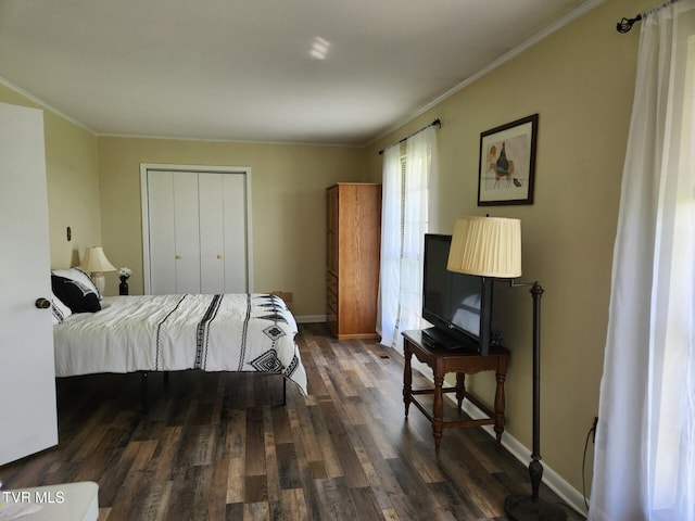 7083 Saint Clair Rd, Whitesburg, TN 37891 - bedroom with dark wood-type flooring, baseboards, a closet, and crown molding
