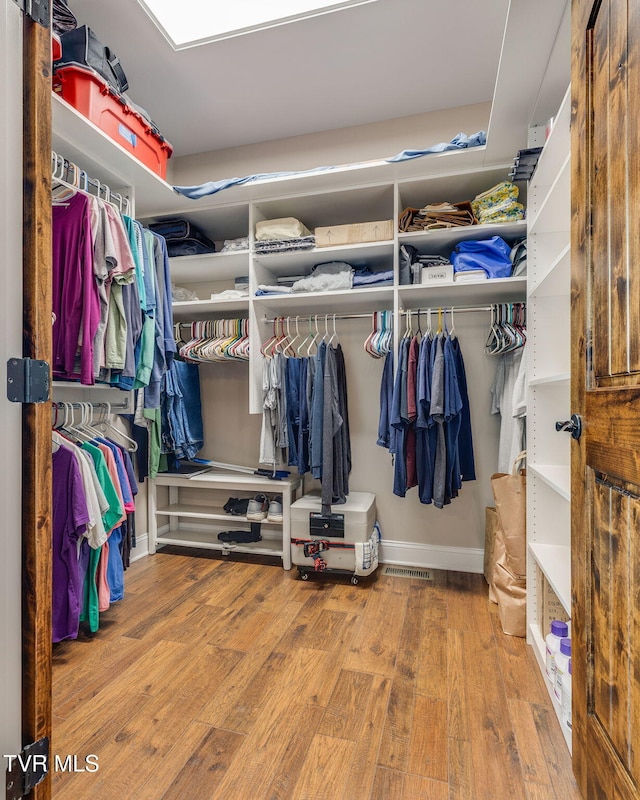 1 Sweetwood Dr, Johnson City, TN 37615 - walk in closet featuring wood finished floors