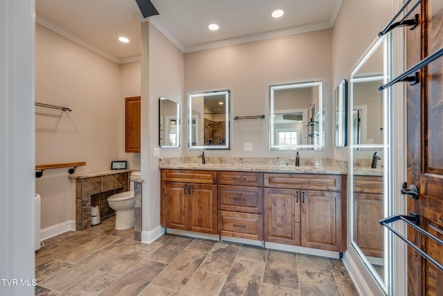 1 Sweetwood Dr, Johnson City, TN 37615 - full bath featuring toilet, double vanity, ornamental molding, baseboards, and recessed lighting