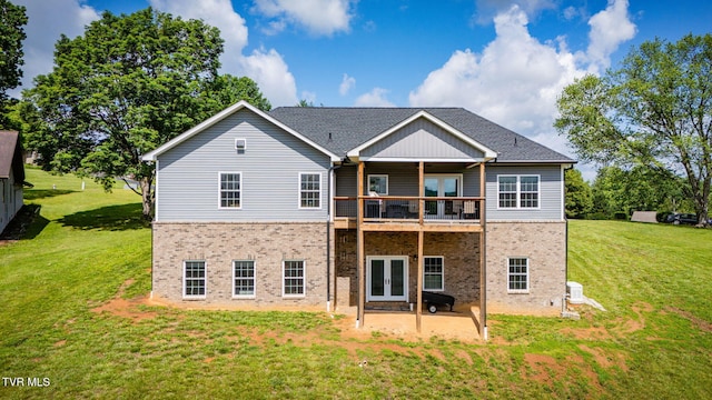 1 Sweetwood Dr, Johnson City, TN 37615 - rear view of house featuring french doors, brick siding, a yard, and a patio