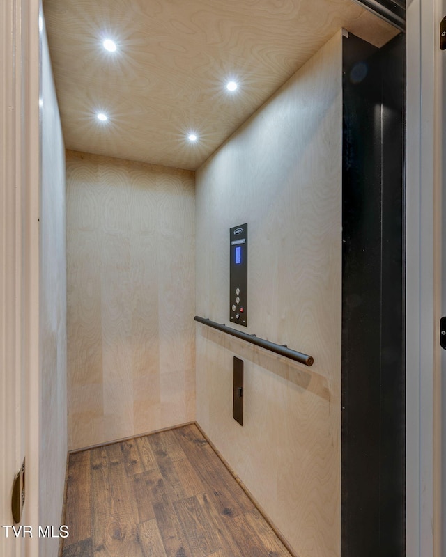 1 Sweetwood Dr, Johnson City, TN 37615 - hallway featuring wood finished floors, recessed lighting, and elevator