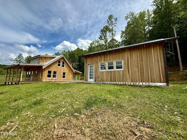 538 Punkton Rd, Del Rio, TN 37727 - back of property featuring a yard and board and batten siding