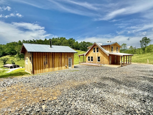 538 Punkton Rd, Del Rio, TN 37727 - back of property featuring board and batten siding and solar panels