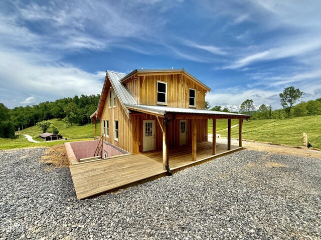 538 Punkton Rd, Del Rio, TN 37727 - back of house with board and batten siding and metal roof