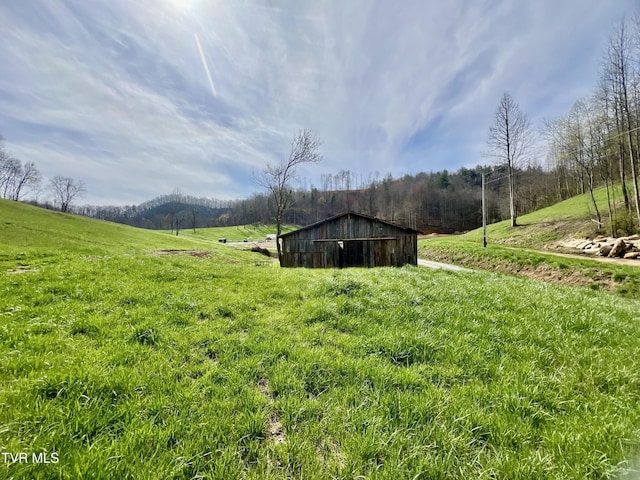 538 Punkton Rd, Del Rio, TN 37727 - view of yard featuring a view of countryside, an outbuilding, and a pole building