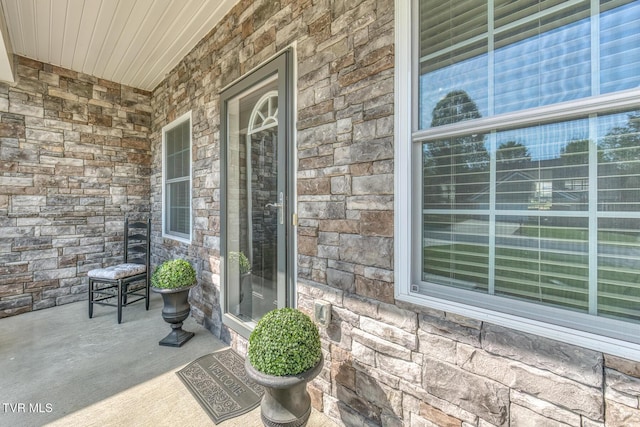 171 Brighton Pl, Bristol, TN 37620 - entrance to property featuring covered porch and stone siding