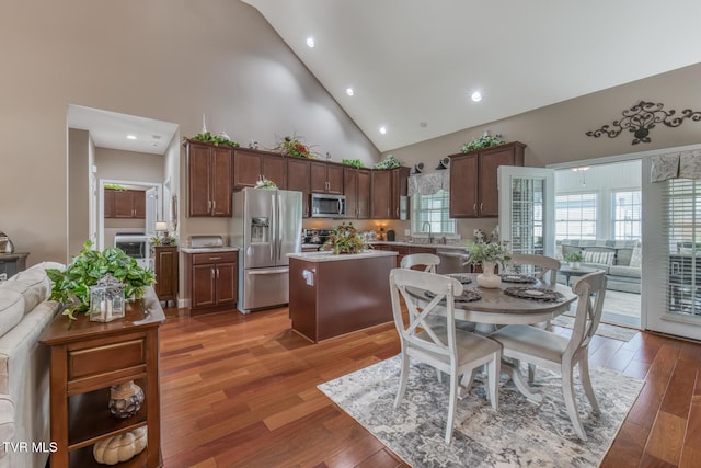 171 Brighton Pl, Bristol, TN 37620 - dining area with high vaulted ceiling, recessed lighting, and light wood finished floors