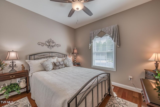 171 Brighton Pl, Bristol, TN 37620 - bedroom with baseboards, wood finished floors, and ceiling fan