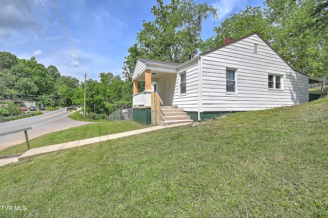 2221 Elizabethton Hwy, Johnson City, TN 37601 - view of front of property with a front lawn and a chimney