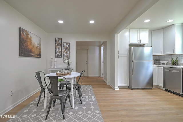 2221 Elizabethton Hwy, Johnson City, TN 37601 - dining space with light wood-style floors, baseboards, and recessed lighting