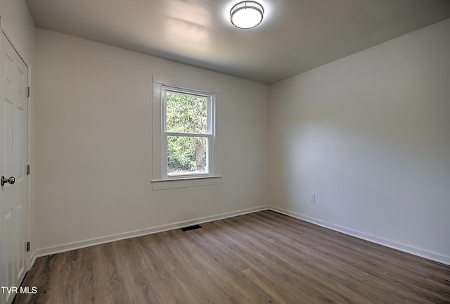 2221 Elizabethton Hwy, Johnson City, TN 37601 - spare room with wood finished floors and baseboards