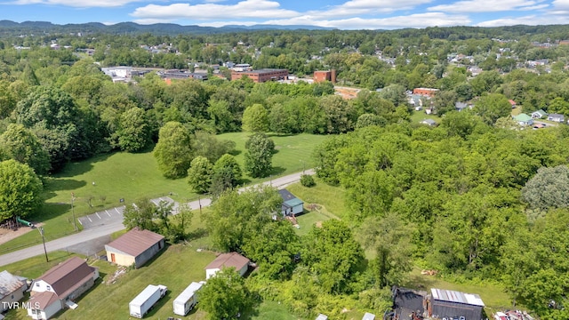 120 Stine St, Bristol, TN 37620 - aerial overview of property's location with a mountainous background and a heavily wooded area