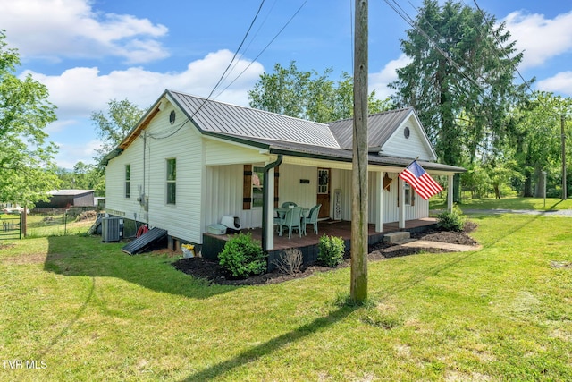 120 Stine St, Bristol, TN 37620 - view of front facade featuring central air condition unit, a porch, and metal roof