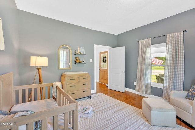 120 Stine St, Bristol, TN 37620 - bedroom with wood finished floors and baseboards