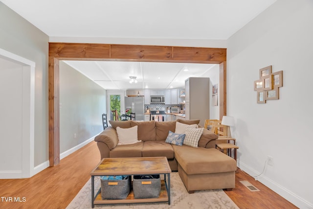 120 Stine St, Bristol, TN 37620 - living area featuring light wood-style flooring, baseboards, and recessed lighting