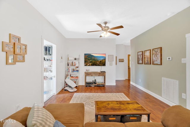 120 Stine St, Bristol, TN 37620 - living area featuring wood finished floors, a ceiling fan, and baseboards