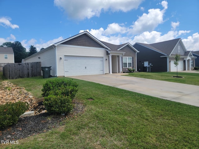 1202 Raccoon Ln, Piney Flats, TN 37686 - ranch-style house with a garage and concrete driveway
