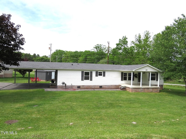 8929 Gateway Dr, Wise, VA 24293 - view of front of home with a porch, crawl space, a carport, a front lawn, and roof with shingles