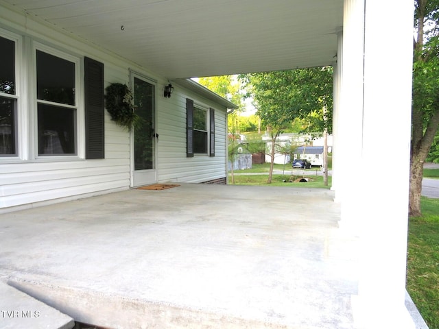 8929 Gateway Dr, Wise, VA 24293 - view of patio featuring an attached carport