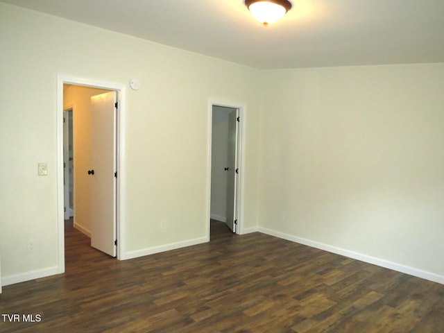 8929 Gateway Dr, Wise, VA 24293 - unfurnished room featuring dark wood-style flooring, baseboards, and a smoke detector