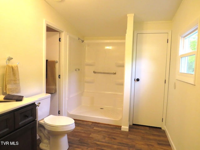 8929 Gateway Dr, Wise, VA 24293 - full bathroom featuring a walk in shower, wood finished floors, vanity, and toilet