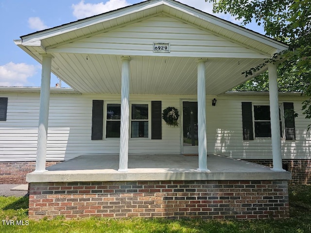 8929 Gateway Dr, Wise, VA 24293 - doorway to property featuring a porch