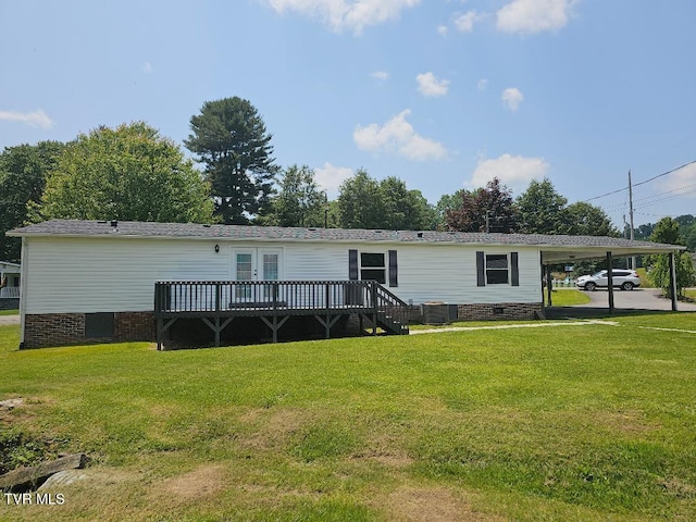 8929 Gateway Dr, Wise, VA 24293 - view of front of house with crawl space, a deck, a front lawn, and an attached carport
