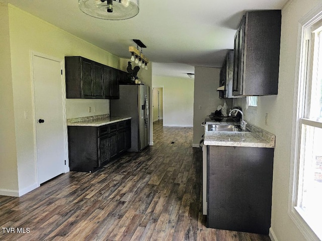 8929 Gateway Dr, Wise, VA 24293 - kitchen with a sink, stainless steel refrigerator with ice dispenser, dark wood-style flooring, light countertops, and plenty of natural light