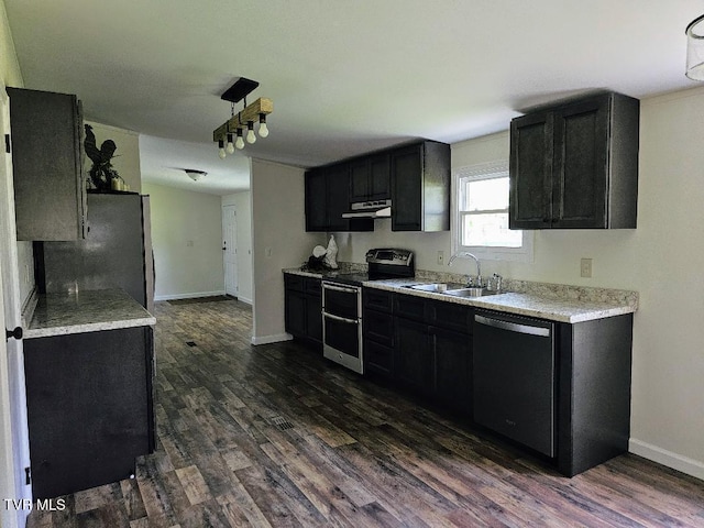 8929 Gateway Dr, Wise, VA 24293 - kitchen with appliances with stainless steel finishes, a sink, dark cabinetry, and dark wood-style flooring