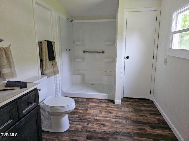 8929 Gateway Dr, Wise, VA 24293 - bathroom featuring wood finished floors, vanity, toilet, and a shower