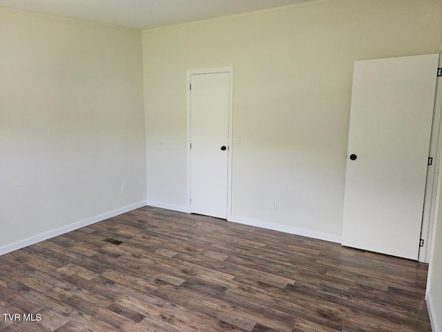 8929 Gateway Dr, Wise, VA 24293 - empty room with dark wood-type flooring and baseboards
