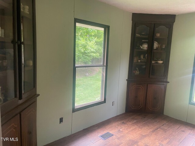 763 Sloantown Rd, Duffield, VA 24244 - unfurnished dining area featuring wood finished floors