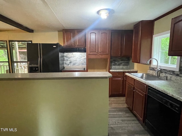 763 Sloantown Rd, Duffield, VA 24244 - kitchen featuring black appliances, a sink, tasteful backsplash, dark wood finished floors, and under cabinet range hood