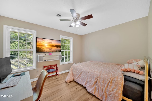 38 Lake Village Ct Unit 38, Johnson City, TN 37601 - bedroom featuring wood finished floors, baseboards, multiple windows, and a desk