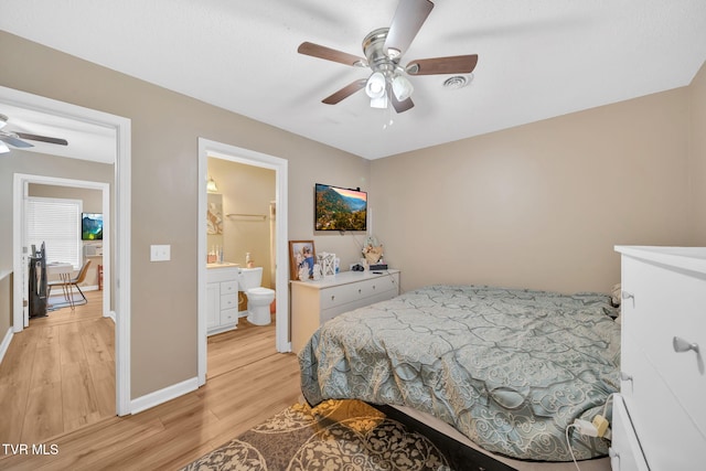 38 Lake Village Ct Unit 38, Johnson City, TN 37601 - bedroom with light wood-type flooring, baseboards, a baseboard heating unit, and a ceiling fan