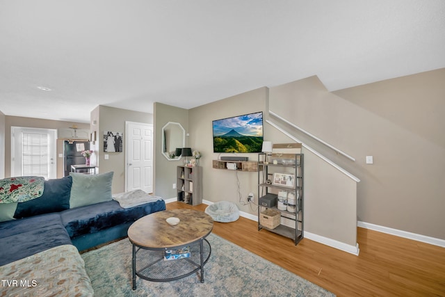 38 Lake Village Ct Unit 38, Johnson City, TN 37601 - living area with wood finished floors, baseboards, and stairs