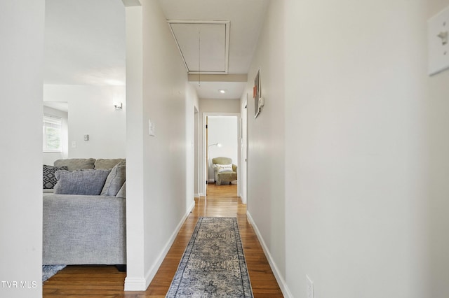744 NE Hurricane Rd, Wise, VA 24293 - hallway featuring attic access, wood finished floors, and baseboards