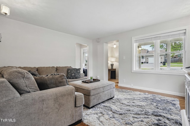 744 NE Hurricane Rd, Wise, VA 24293 - living room featuring wood finished floors and baseboards