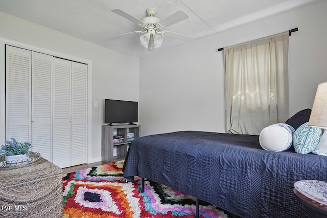 744 NE Hurricane Rd, Wise, VA 24293 - bedroom with wood finished floors, ceiling fan, a closet, and baseboards