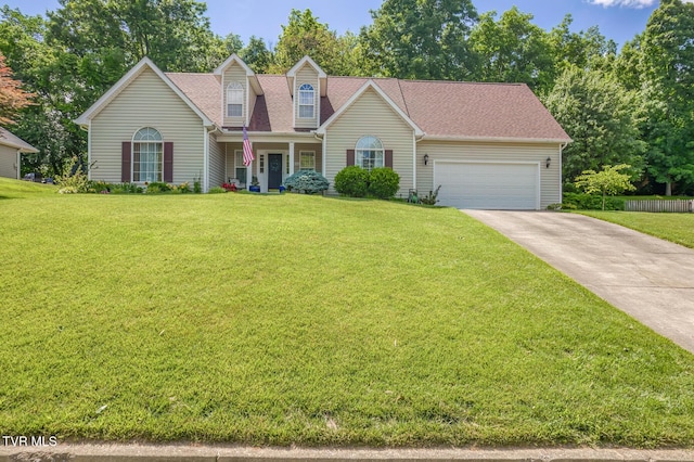620 Glen Oaks Pl, Johnson City, TN 37615 - cape cod house with an attached garage, a front lawn, driveway, and roof with shingles
