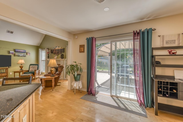 620 Glen Oaks Pl, Johnson City, TN 37615 - doorway to outside featuring light wood-style flooring and vaulted ceiling