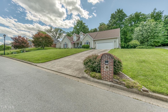 620 Glen Oaks Pl, Johnson City, TN 37615 - traditional-style home featuring concrete driveway, a front lawn, and a garage