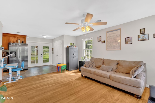 324 Reservoir St, Bristol, VA 24201 - living room with french doors, a ceiling fan, and light wood-style flooring